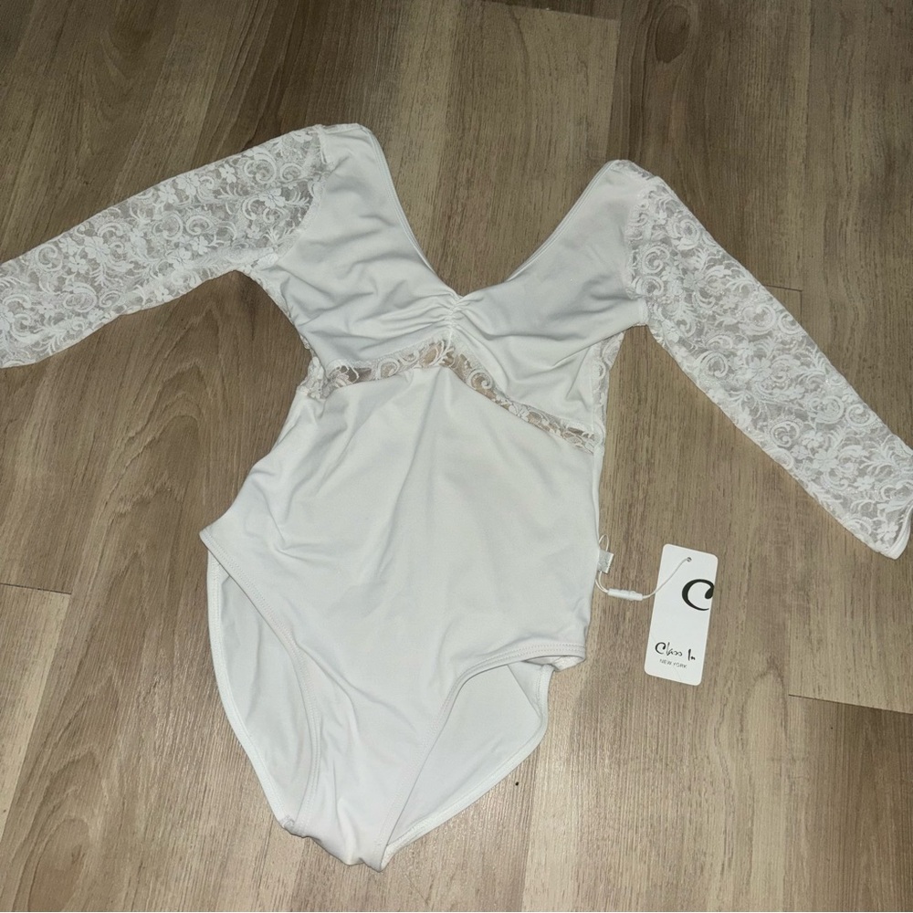 Class in dancewear ballet leotard white